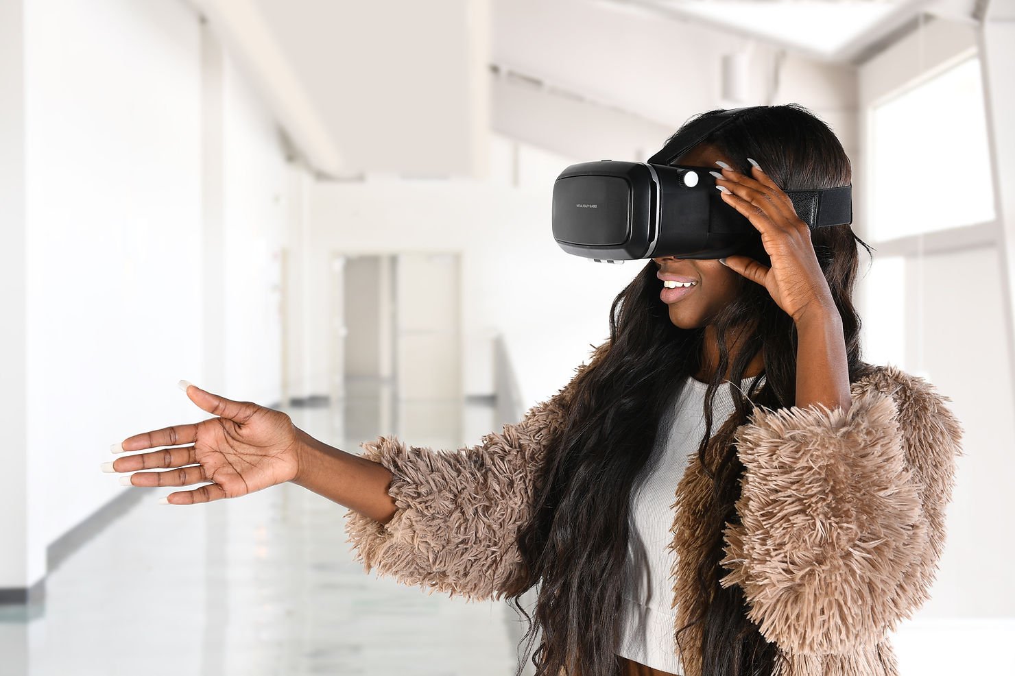 woman waring VR goggles.